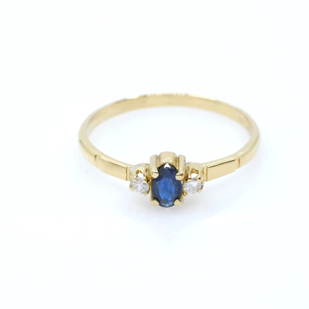 Anillo en oro 18k zafiro y brillantes Anillo en oro 18k zafiro y brillantes