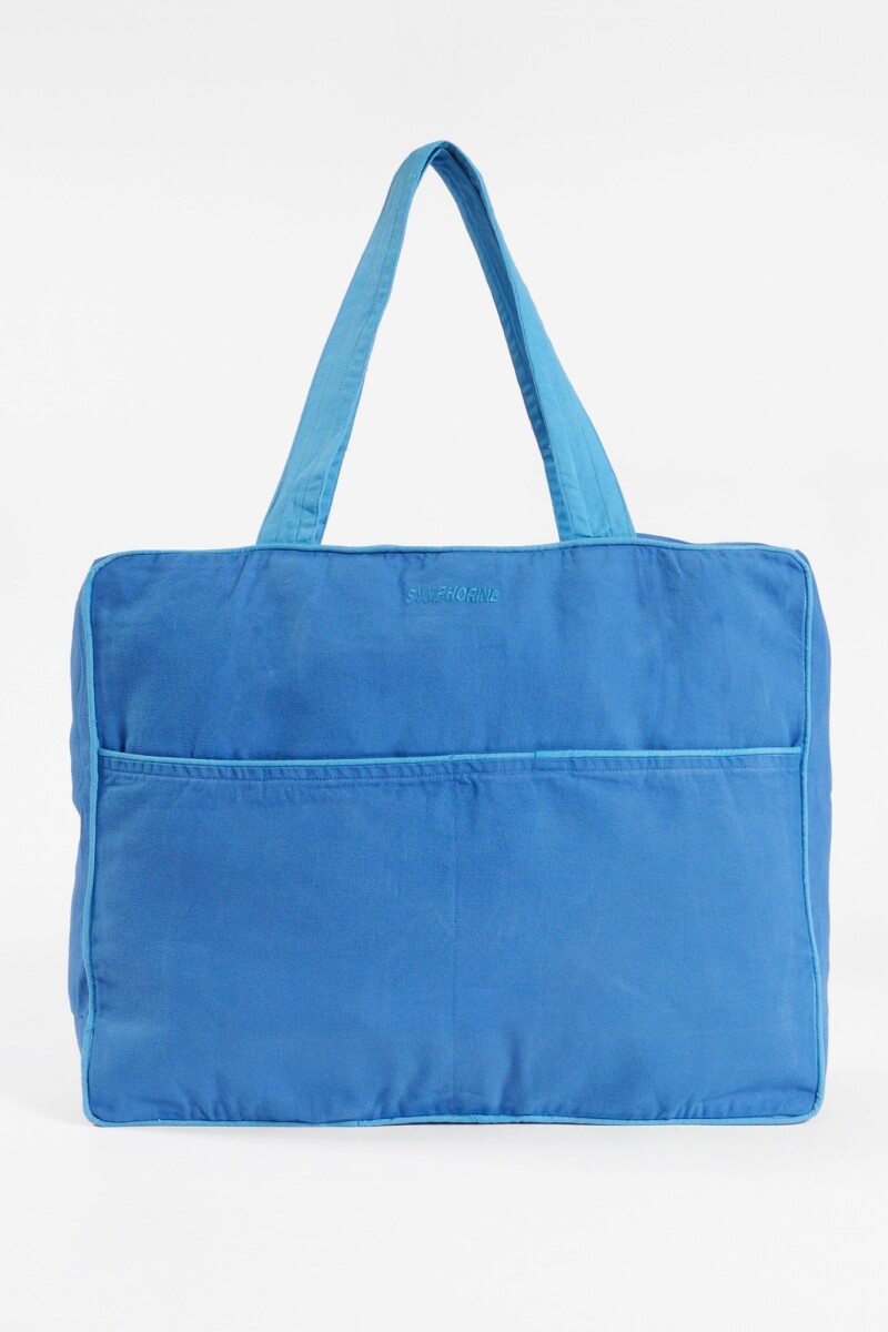 Bolso con vivos en contrastes azul