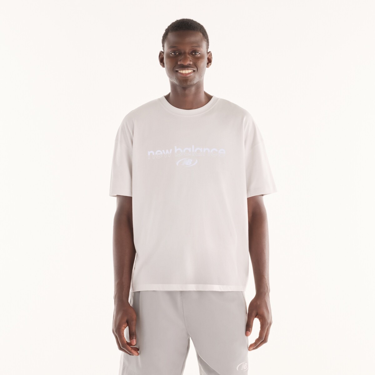 Remera New Balance de Hombre - Trackside - MT6279IZGYM - CHARCOAL GREY 