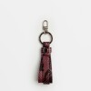 Llavero Melly En Cuero Snake Metalizado Bordeaux