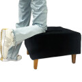Puff tela y patas de madera Negro