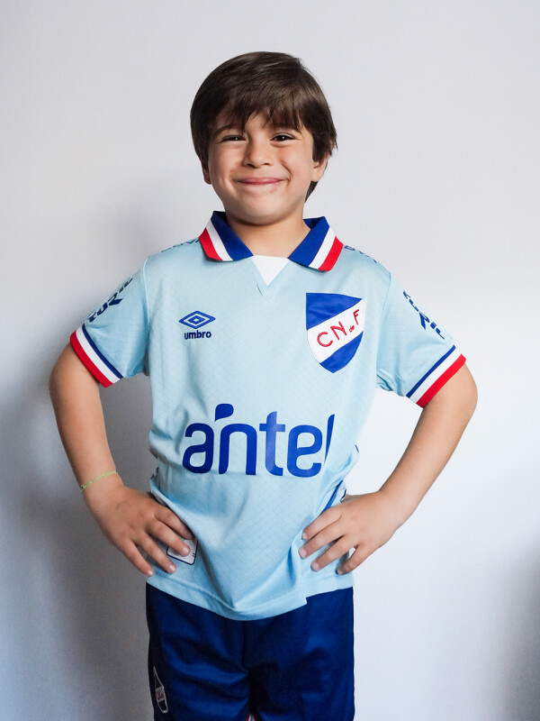 CAMISETA DE JUEGO OFICIAL AWAY 3 Nacional Junior Skuba, Celeste
