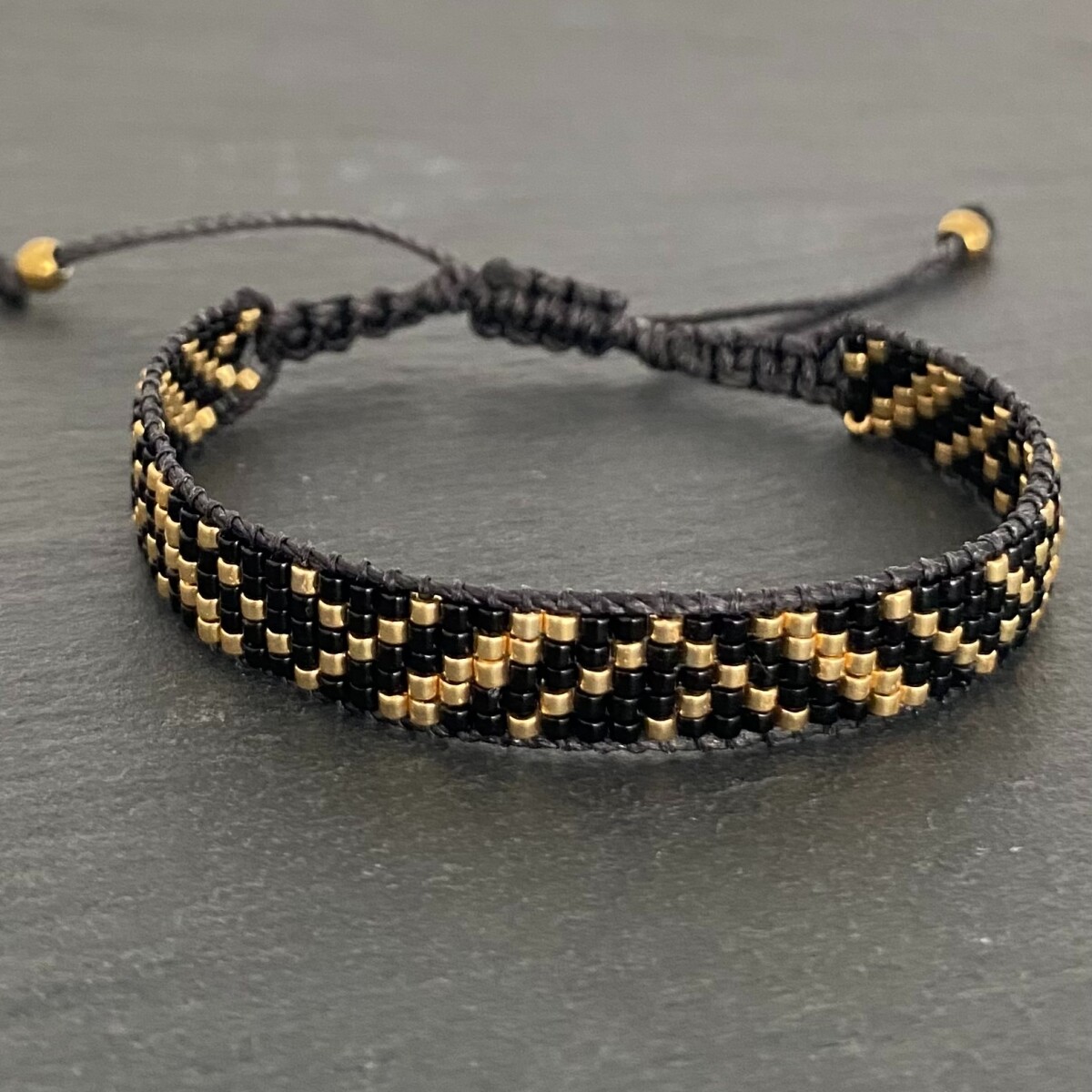 Pulsera BLACK CORE tejida 