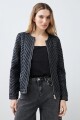 Chaqueta eco cuero con tul negro