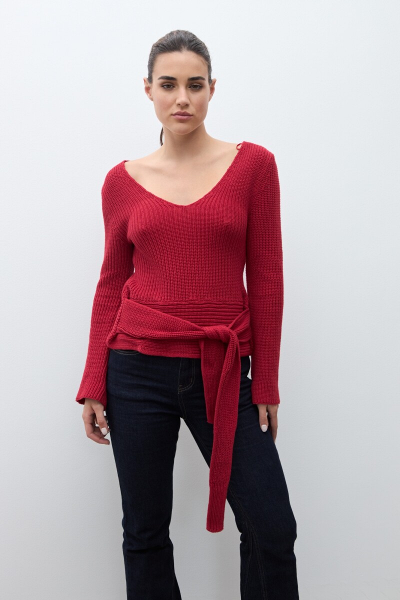 Sweater con lazo rojo