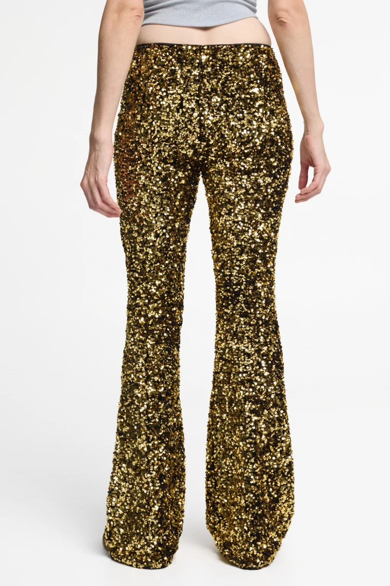 PANTALON FLARE DE LENTEJUELAS. Oro