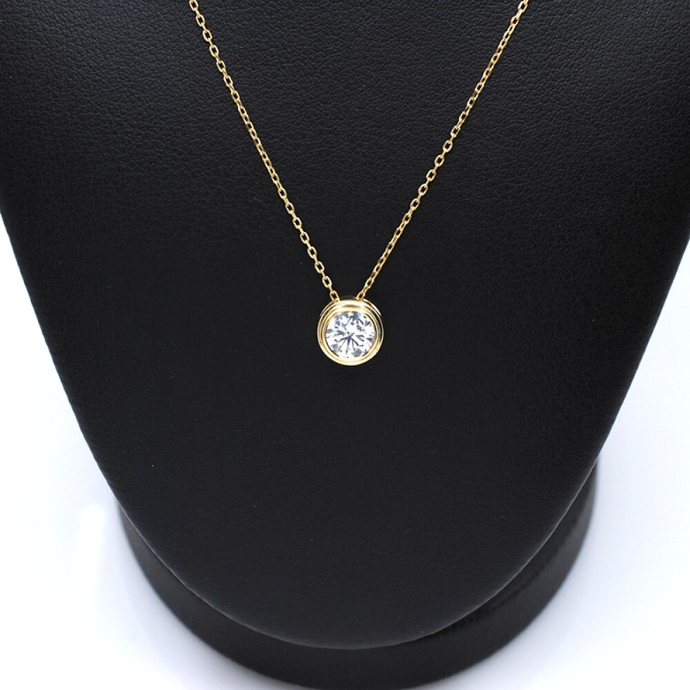 Dije en oro 18k amarillo con zirconia Dije en oro 18k amarillo con zirconia