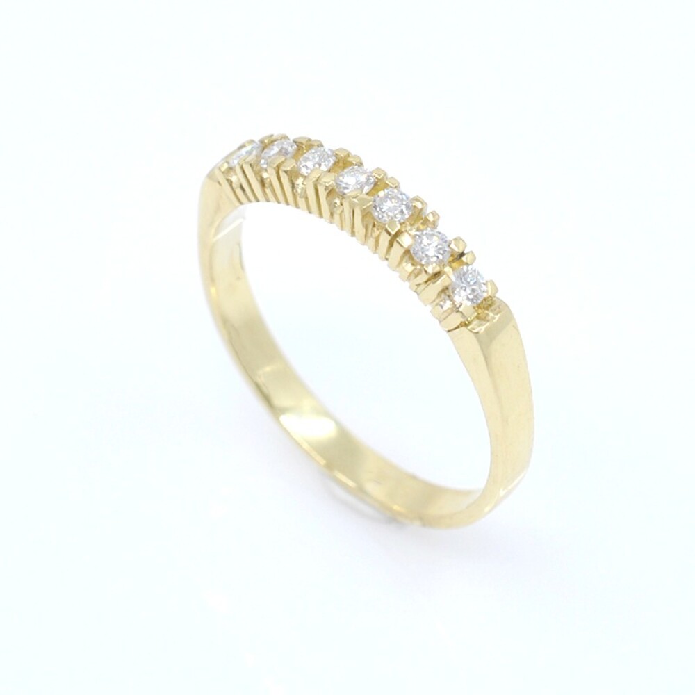 Anillo medio sin fin en oro 18k y brillantes Anillo medio sin fin en oro 18k y brillantes