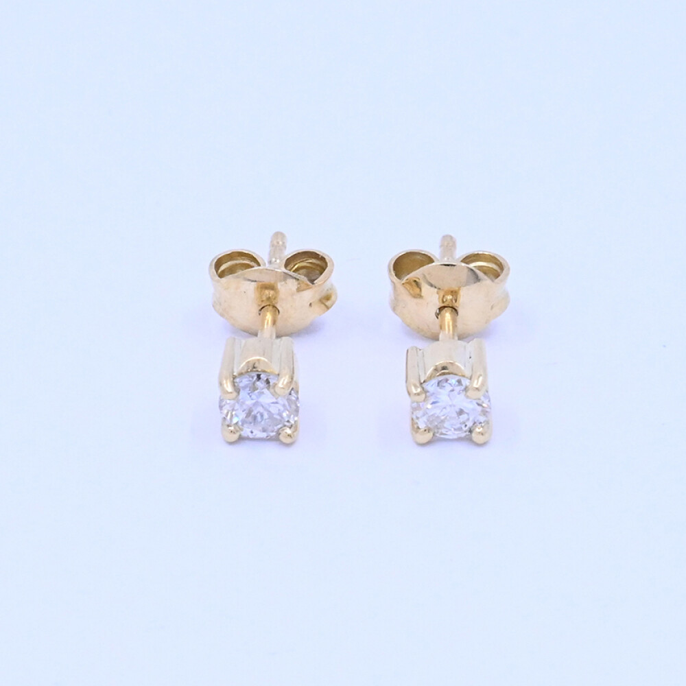 Caravanas oro 18k amarillo engarce 4 puntas con brillantes. Caravanas oro 18k amarillo engarce 4 puntas con brillantes.