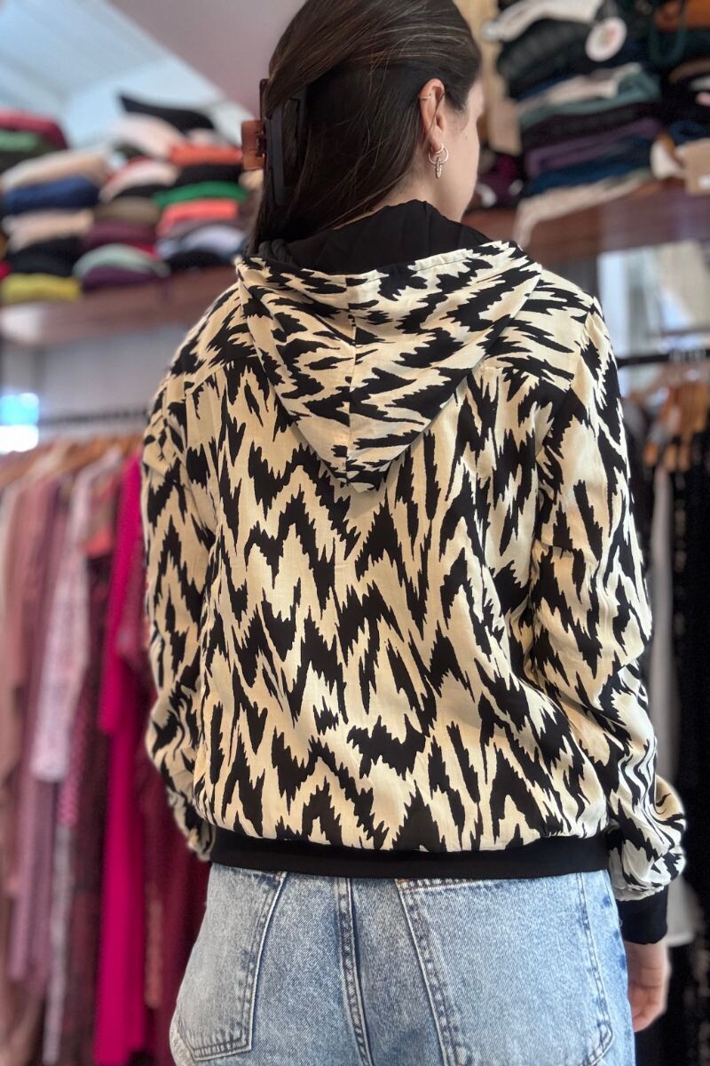 Campera capucha rayón Blanca y negra