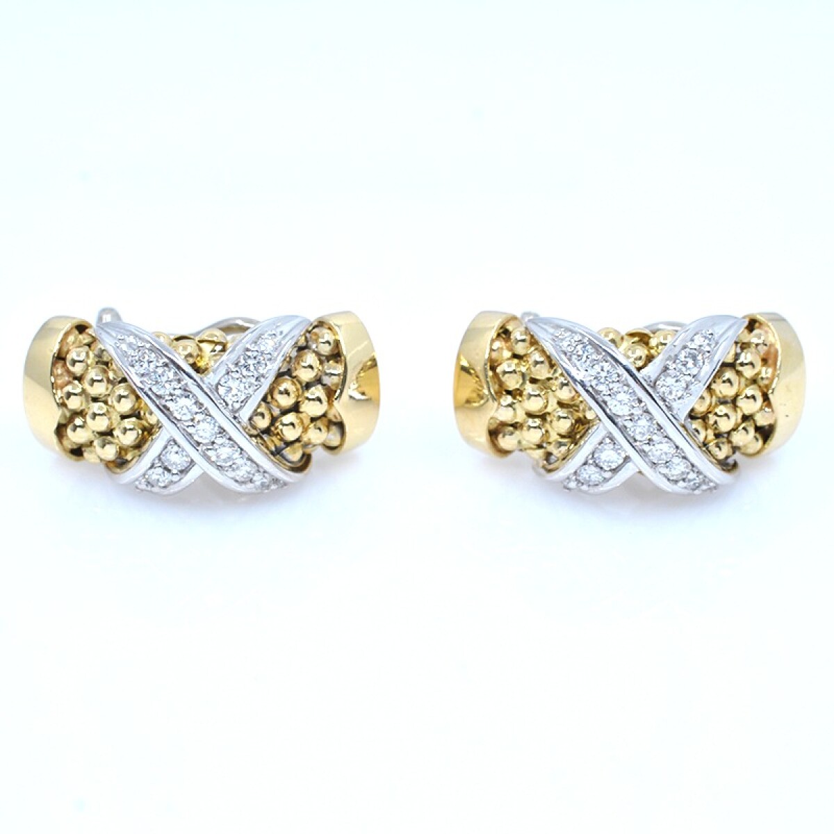 Caravanas clips combinadas en oro 18k con brillantes 