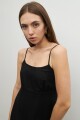 Vestido corto de lino con volado negro