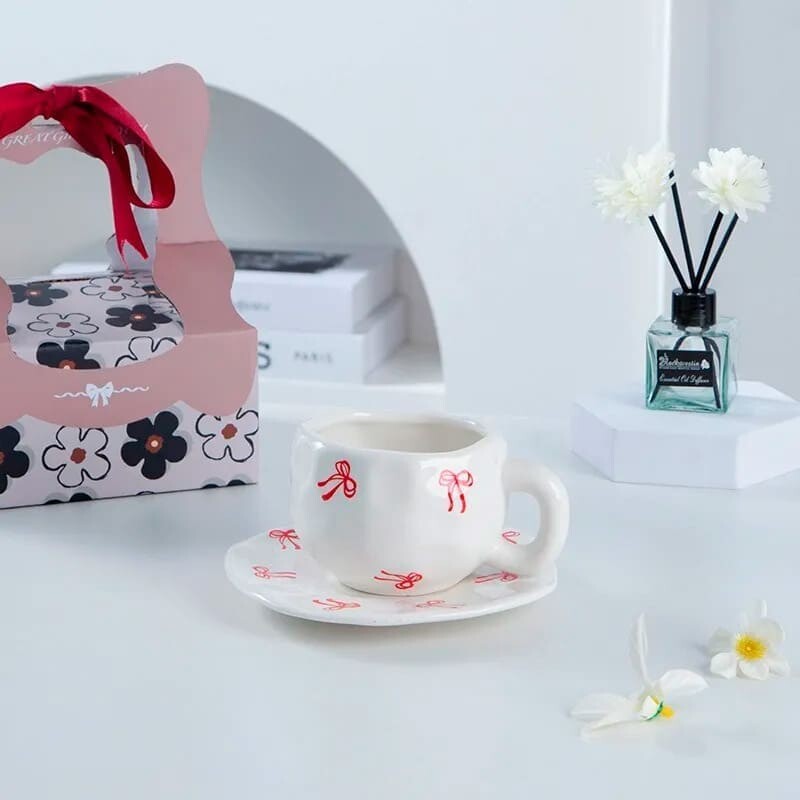 Taza de cerámica moños 350ml Taza de cerámica moños 350ml