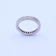 Anillo sin fin oro 18k con brillantes engarzado en granito. Anillo sin fin oro 18k con brillantes engarzado en granito.