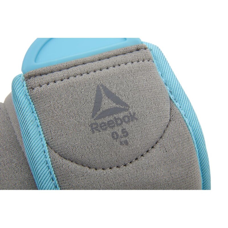 Muñequeras con peso Reebok 0.5kg Celeste