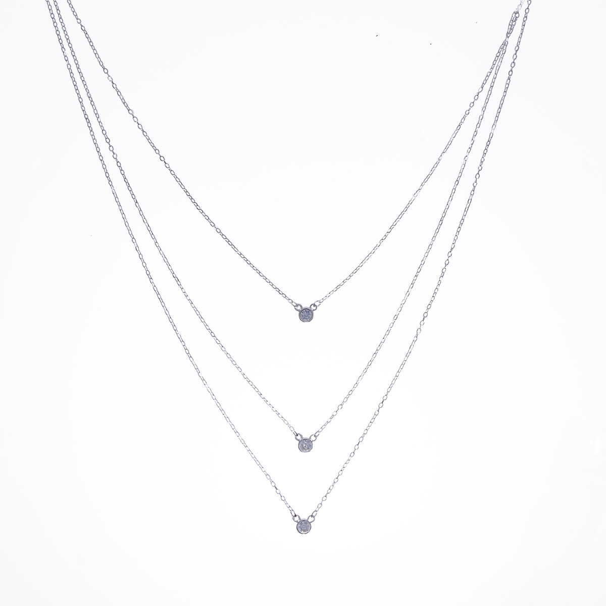 Conjunto de cadena y punto de luz de plata 925 con circonia. 