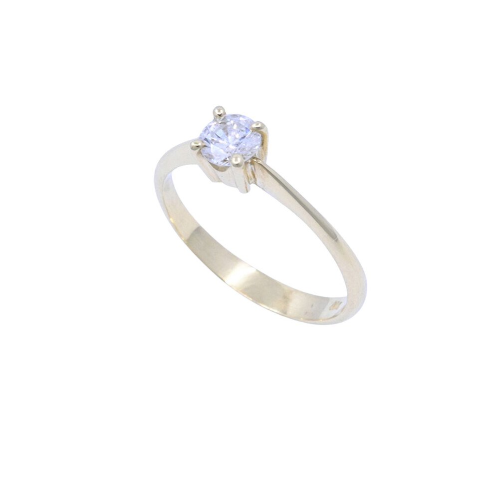 Anillo solitario oro 18k y brillante engarce 4 puntas. Anillo solitario oro 18k y brillante engarce 4 puntas.