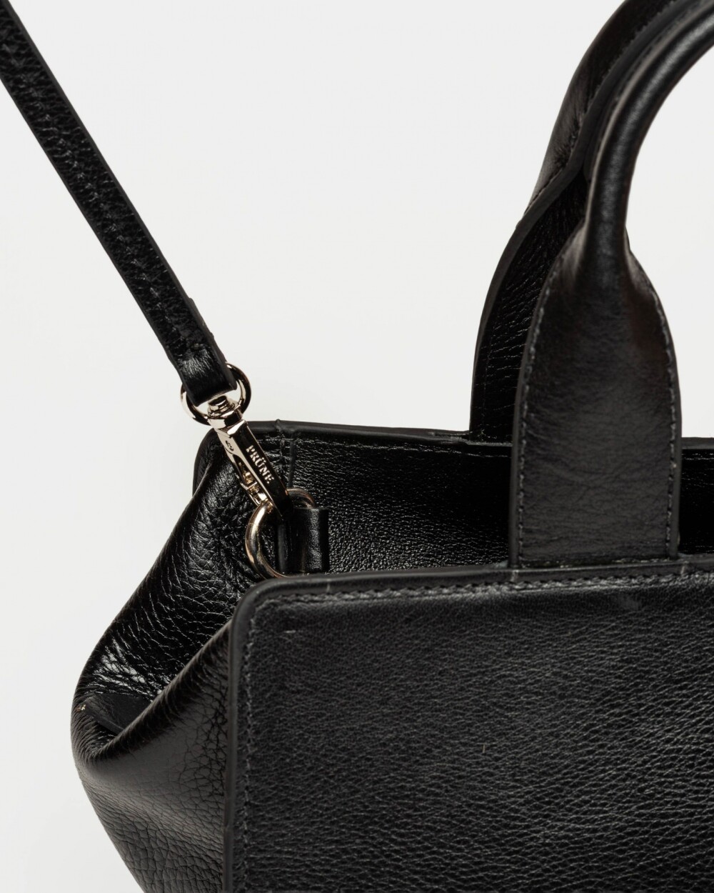 Cartera de mano Mila en cuero liso Negro