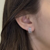 Aros de oro blanco 18k con triple hilera de circonias Aros de oro blanco 18k con triple hilera de circonias