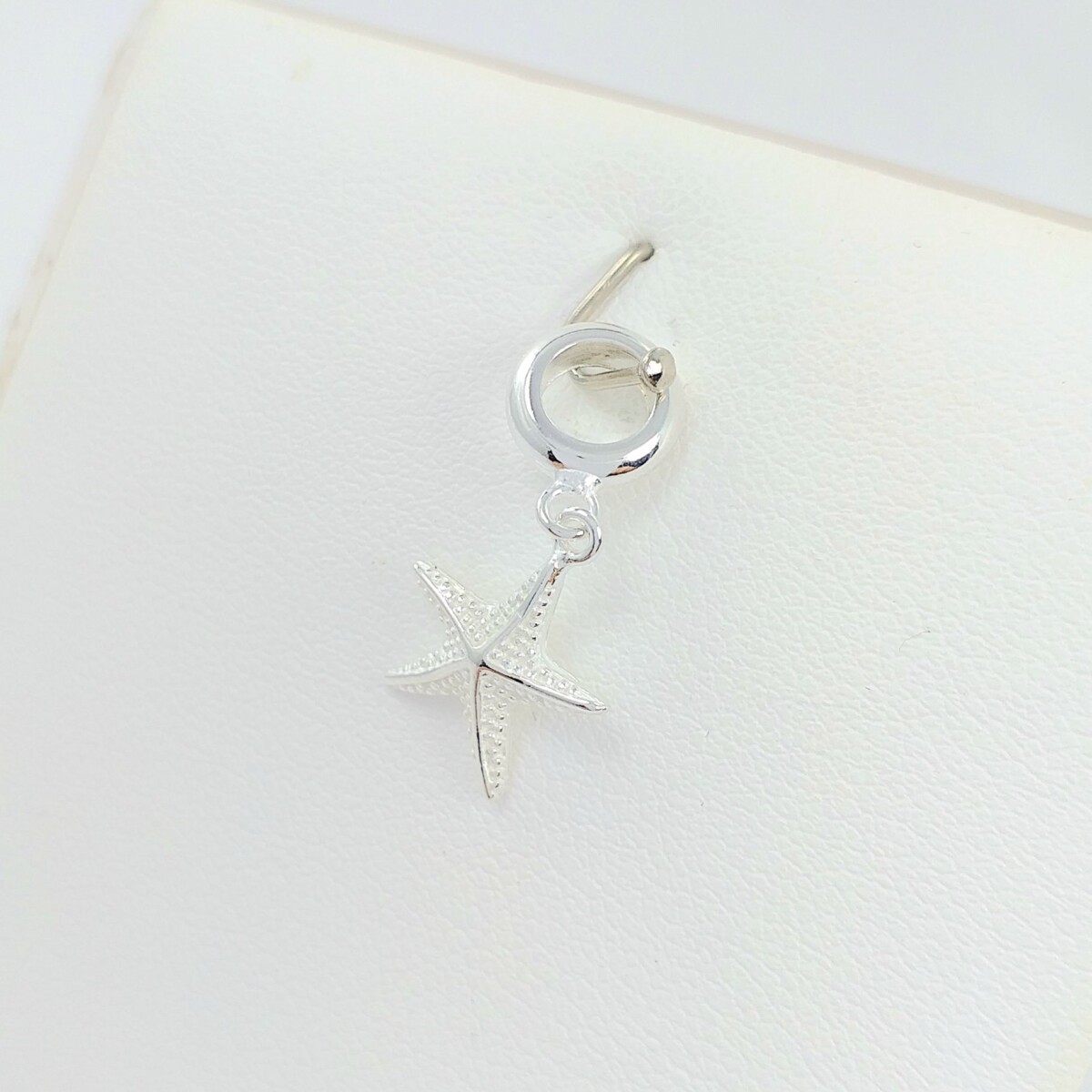 Dije ESTRELLA DE MAR , plata 925. 