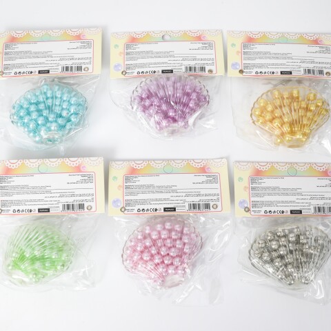 JUGUETE ANTIESTRÉS DE APRETAR CON RETORNO LENTO (PERLA – CONCHA) JUGUETE ANTIESTRÉS DE APRETAR CON RETORNO LENTO (PERLA – CONCHA)