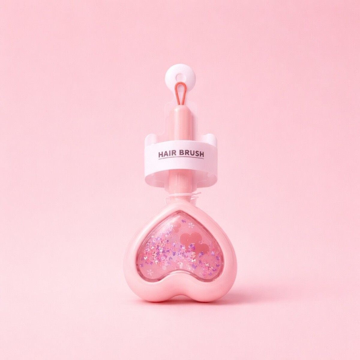 CEPILLO DE PELO EN FORMA DE CORAZÓN CON BRILLO MÓVIL (CONEJO/ROSA) 