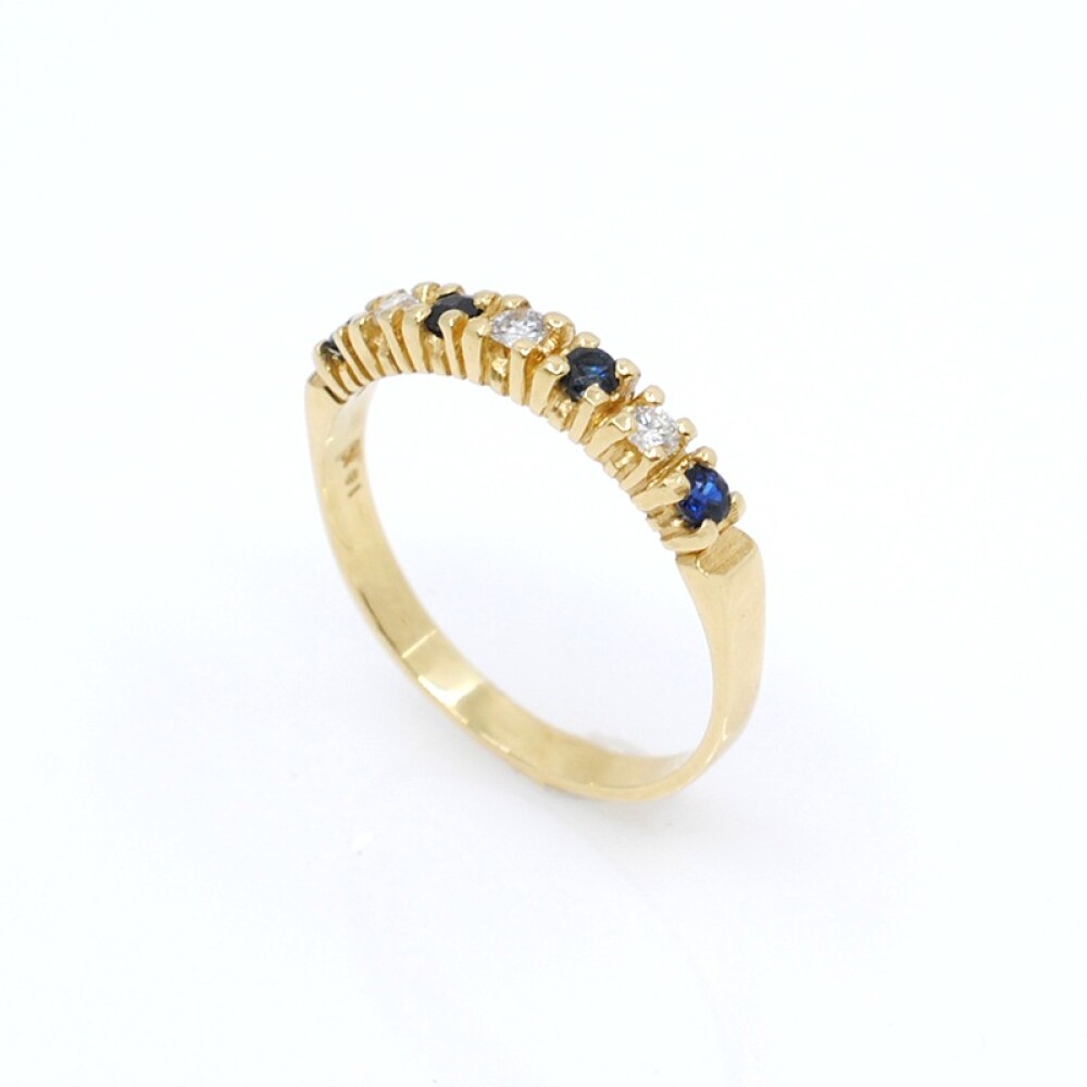 Anillo en oro 18k , brillantes y zafiros Anillo en oro 18k , brillantes y zafiros