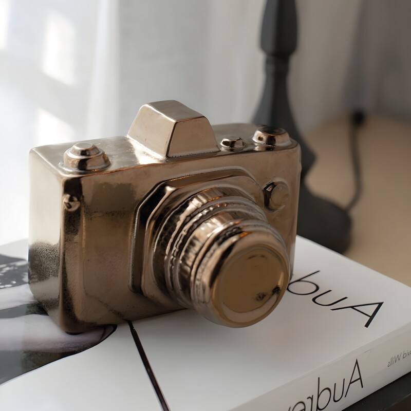 CAMARA DECORATIVA 15x13x11CM DORADO CAMARA DECORATIVA 15x13x11CM DORADO