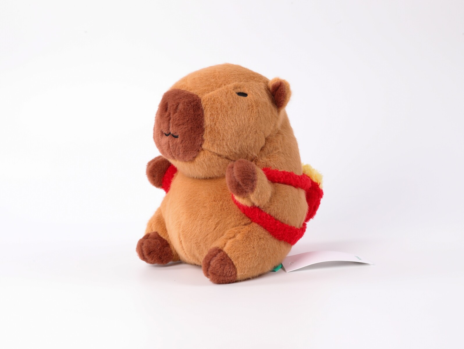 PELUCHE DE 23 CM (MOCHILA DE CAPIBARA MARRÓN CON PATATAS FRITAS) 