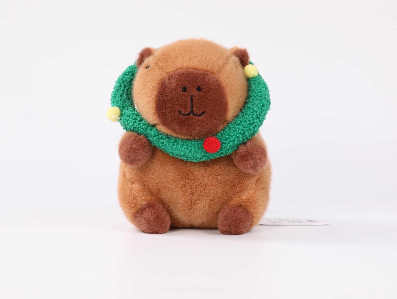 PELUCHE NAVIDEÑO DE 24 CM (CAPIBARA CON CORONA VERDE) 