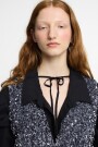 VEST DE LENTEJUELAS CON BOTON Plata