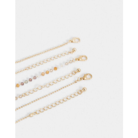 Set De Pulseras Flexibles Con Dije Dorado