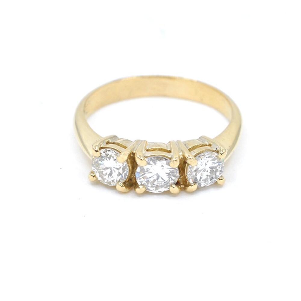 Anillo en oro 18k amarillo y 3 brillantes Anillo en oro 18k amarillo y 3 brillantes