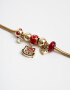 Pulseras Flexibles Multi dijes Pulsera Flexible Multicharm Hello Kitty - Dorado
