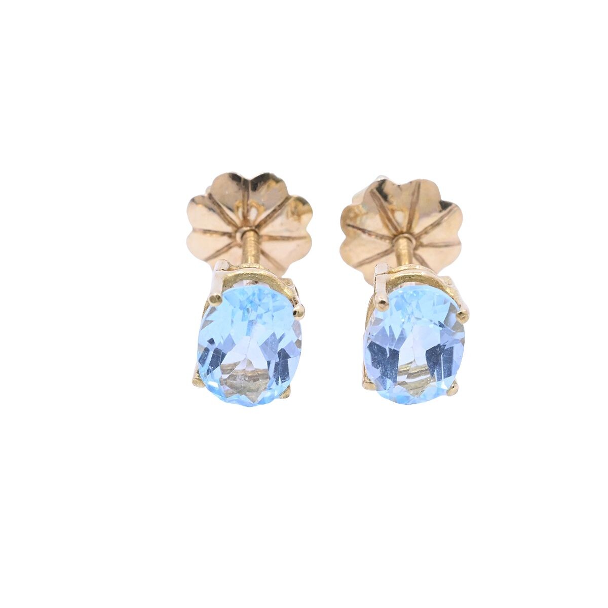 Caravanas oro 18k con topacios celestes oval. 