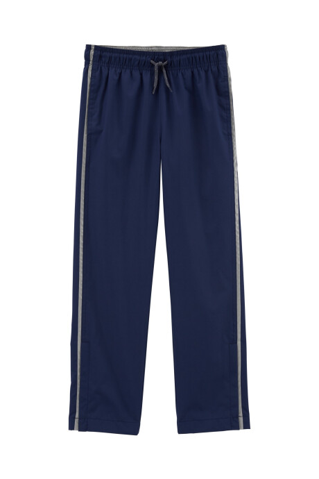 Pantalón deportivo de poliéster con refletantes. Talles 6-8 Sin color