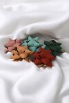 Moño cocarda papel 1.9 cm SURTIDO LISO