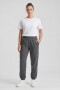 Pantalón dep clásico c/puños elásticos - UNISEX Gris melange oscuro
