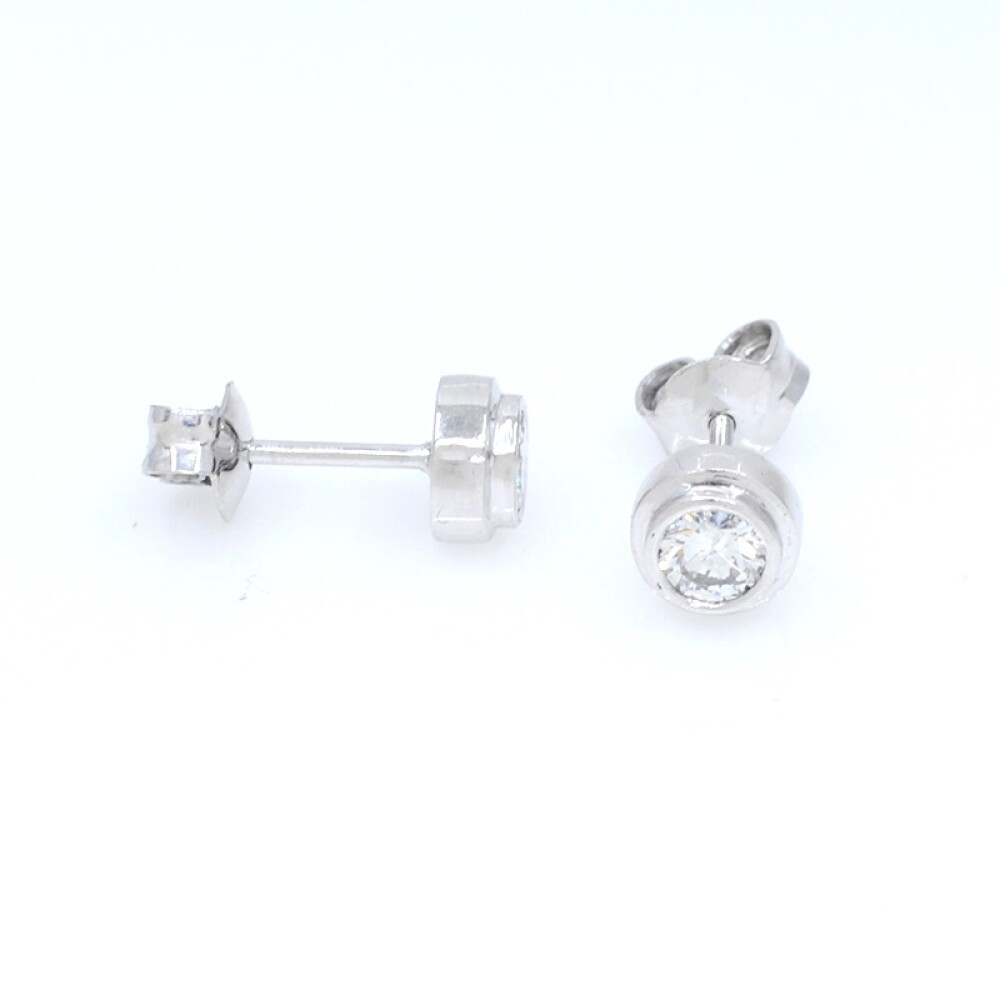 Caravanas en oro blanco 18k y brillantes Caravanas en oro blanco 18k y brillantes