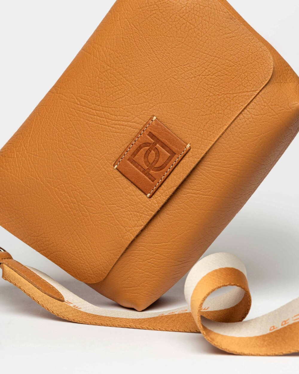 Morral Nina en cuero graneado Cuoio