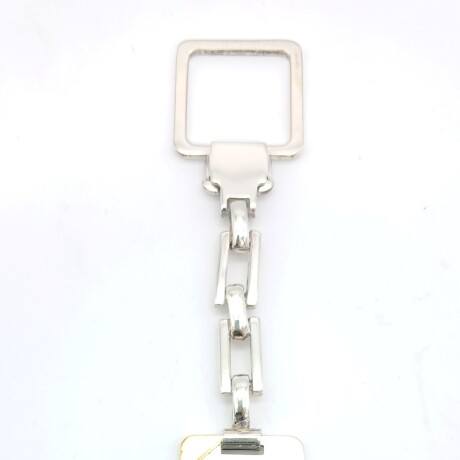 Llavero de plata 925 y double en oro 18 ktes. Llavero de plata 925 y double en oro 18 ktes.