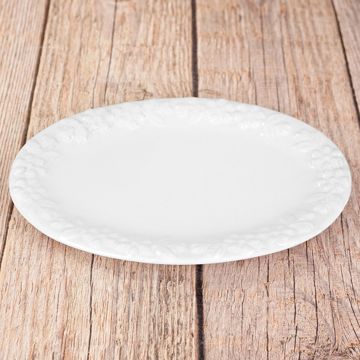 Plato oval de ceramica labrado con flores 