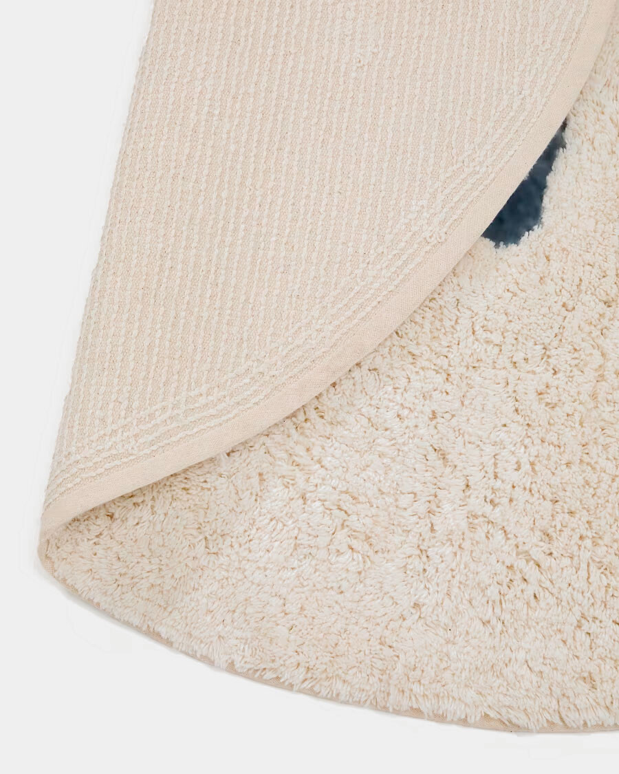 Alfombra redonda Tandani de algodón beige con elefante azul Ø 100 cm