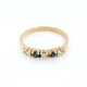 Anillo medio sin fin en oro 18K con brillantes y zafiros Anillo medio sin fin en oro 18K con brillantes y zafiros