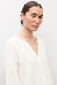 Blusa plumeti escote V crudo