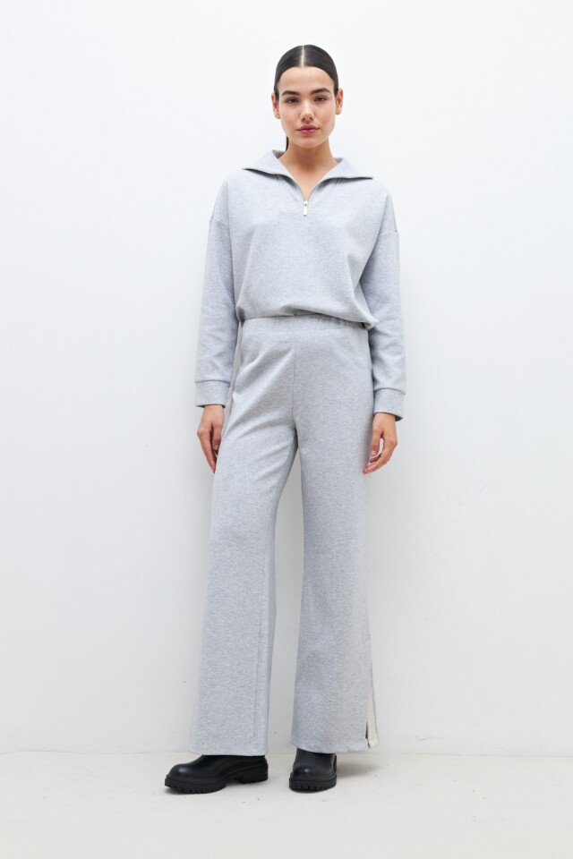 Pantalón con tajos laterales gris melange