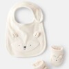 Set babero y zapatitos primer muda Carters blanco