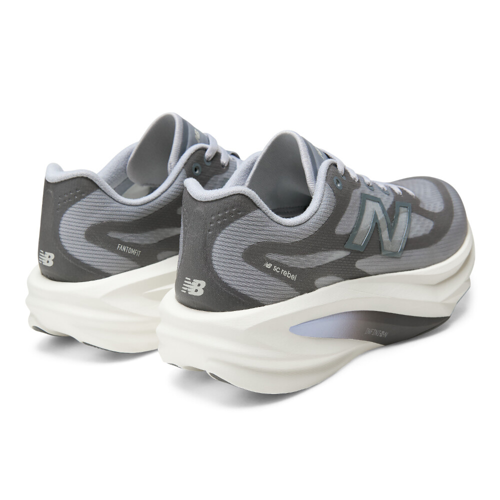 Zapatillas Running Supercomp Rebel V1 Mujer Grey