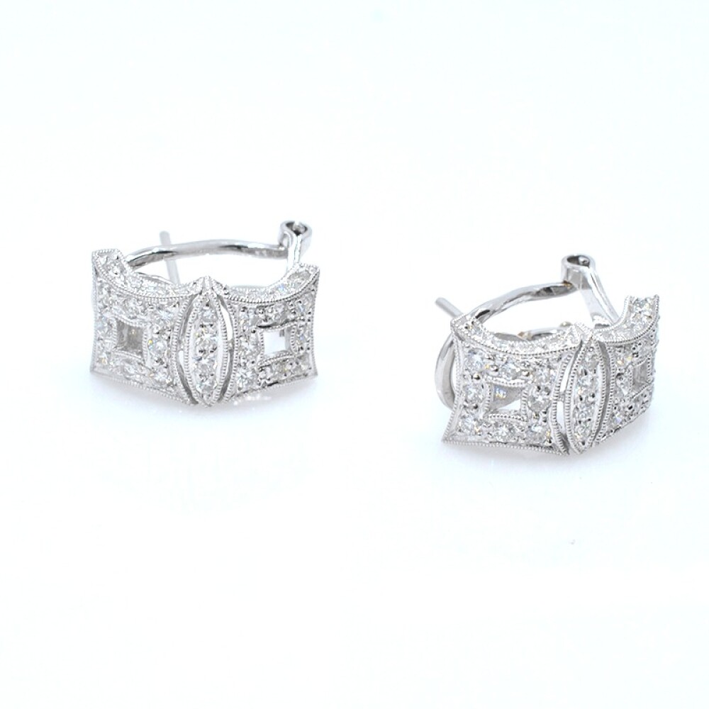 Caravanas clips 18k en oro blanco con brillantes Caravanas clips 18k en oro blanco con brillantes