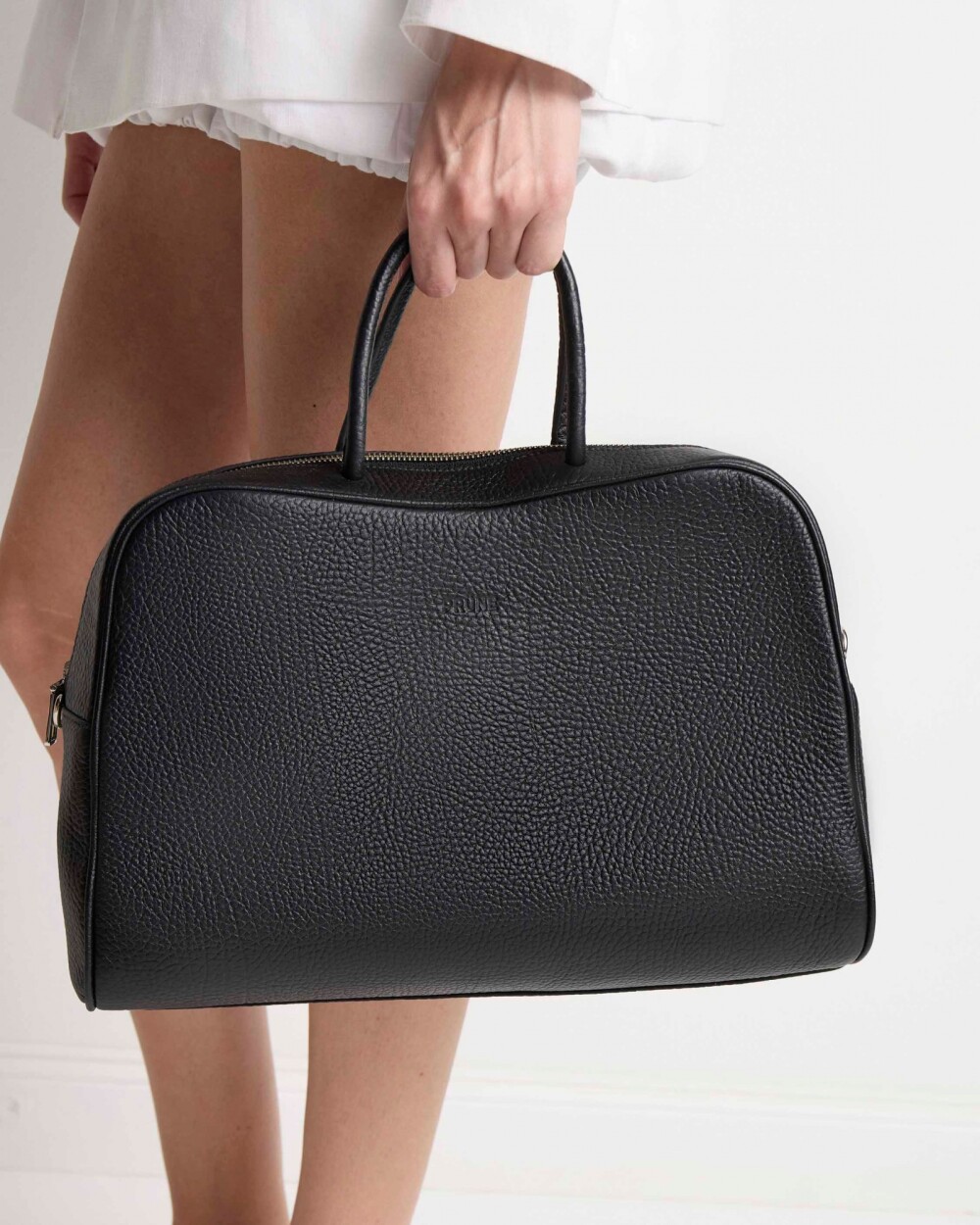 Cartera de mano The Club en cuero graneado Negro